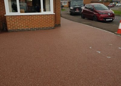 Resin bound driveway Red resin bound driveway permeable surface surfacing options sustainable surfacing