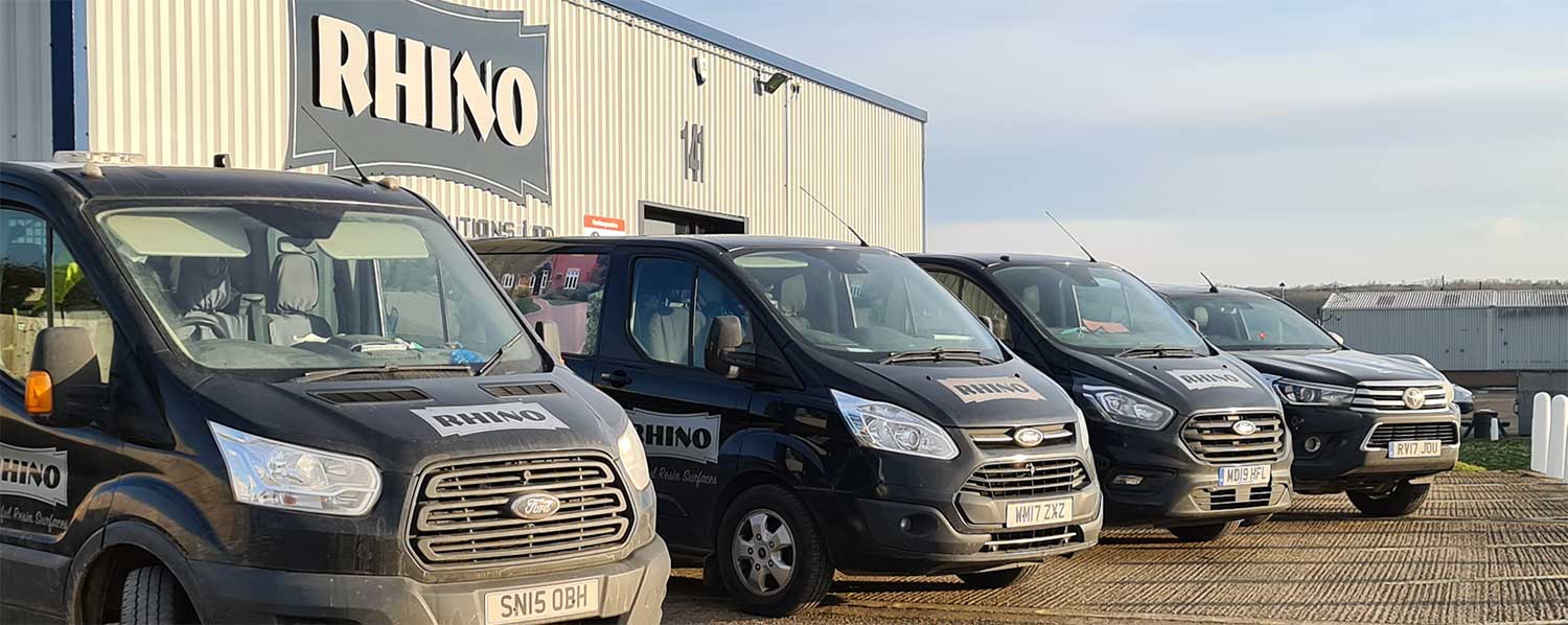 This is the Rhino Surfaces fleet of vans outside our head office